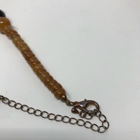 Vintage Brass pendent with butterscotch and black plastic beads necklace. - Picture 5 of 6